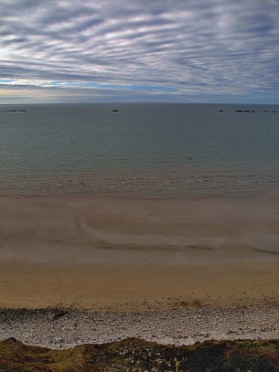 pobřeží u Arromanches